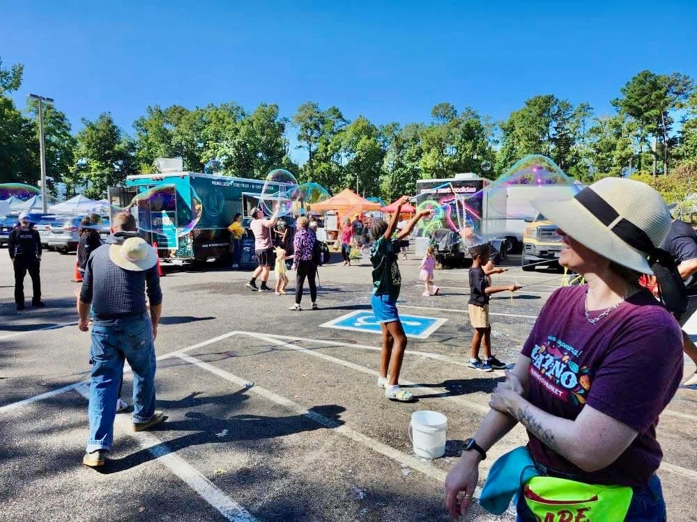 Giant bubbles floating over the market